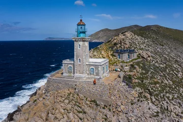 Foto op Aluminium Lighthouse at cape Tainaron lighthouse in Mani Greece. Cape Tenaro, (Cape Matapan) is the southernmost point of mainland Greece © Mariana Ianovska