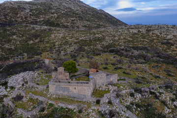 Fototapeta na wymiar Aerial view of old traditional monastery near Gonea village on Mani semi-island, Peloponnese, Greece