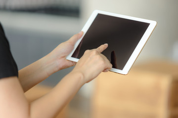 Close-up of businesswoman using a digital tablet