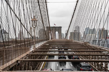 Foto op Canvas Brooklyn bridge. Rainy Brooklyn bridge view. Brooklyn bridge close up view. Rainy day at Brooklyn bridge.  © tanya