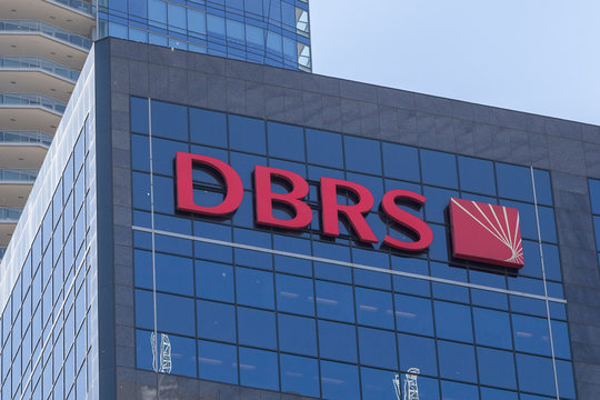 Toronto, Canada - June 19, 2018: Sign of DBRS on the Headquarters building in Toronto. DBRS is a global credit rating agency (CRA). 