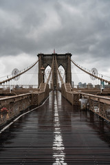 Fototapeta na wymiar Brooklyn bridge. Rainy Brooklyn bridge view. Brooklyn bridge close up view. Rainy day at Brooklyn bridge. 