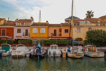 small Citi with big canal and lot of boats close to houses , look like Venice , Port Saplaya ,Alaboraya, Spain  