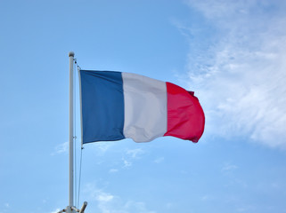 Flag of France on blue sky