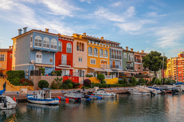 small Citi with big canal and lot of boats close to houses , look like Venice , Port Saplaya...