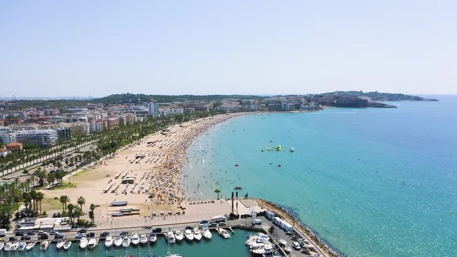 Endless multi-kilometer beach of Salou with a quadrocopter. The best place to stay for tourists from all over the world.