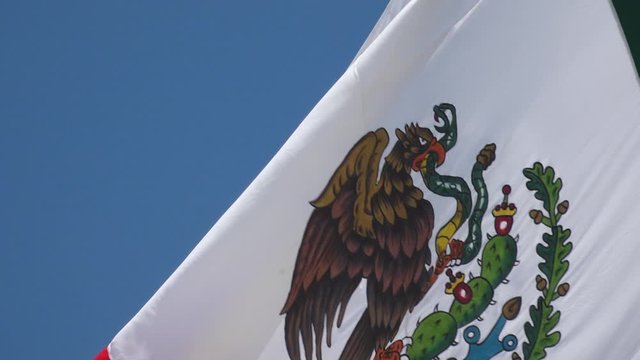 Flag of Mexico Billowing in Slow Motion Close Up on Sunny Day in San Jose del Cabo, Baja California