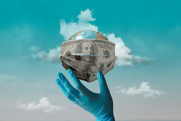 Creative concept of the 2020 economic crisis, money inflation during the coronavirus, unemployment. The photo shows a medical mask of dollars on a globe