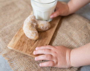 hand holding a glass of milk