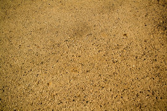 The texture of yellow asphalt.