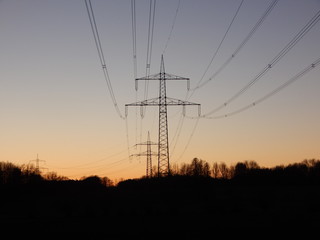 Fototapeta premium power lines at sunset