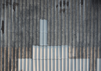 Obraz premium Old roof with tiles.Roof top of factory.