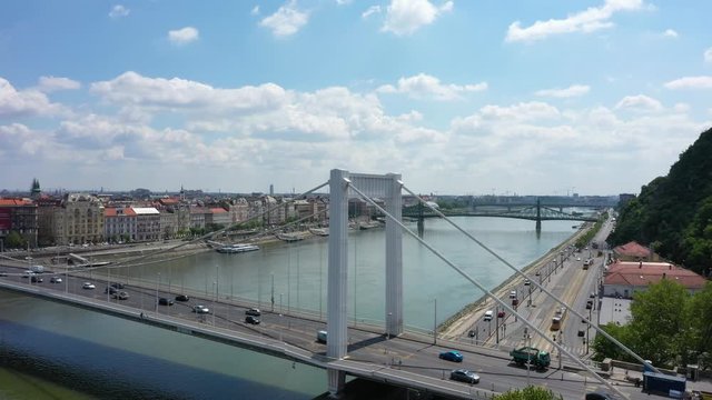 Drone footage from the Erzsebet Bridge in Budapest, Hungary in sunny spring time afternoon
Drone moves up and backwards