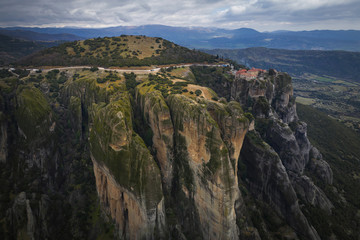 Fototapeta na wymiar Monastery on a high steep rock, Meteora, Greece
