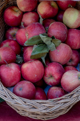 Healthy Organic red Apples in the Basket in a market during food festival.