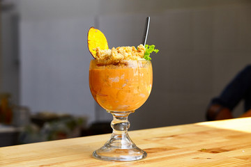 Peruvian cevichop with lettuce red pepper and fried seafood