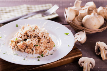 risotto with mushrooms, fresh herbs and parmesan cheese. Tasty and healthy vegetarian lunch