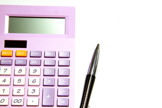 Purple calculator and pen