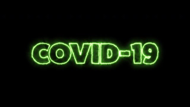 COVID-19 text word written in flaming green letters on a black background. Animated Graphic motion design illustration advertising 4K UHD. Health, security, Pandemic, world lockdown.