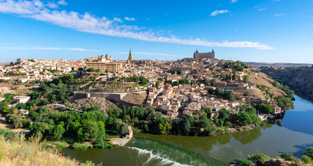 Toledo city in Spain whole cityscape from the hill with blue sky - 346373294