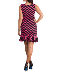 Beautiful woman dressed in evening gown over white background