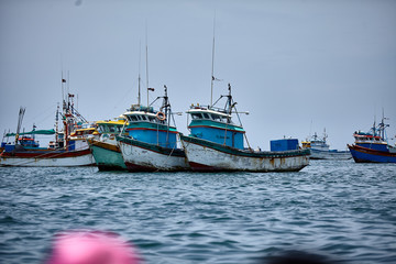 artisanal fishing boats on sea