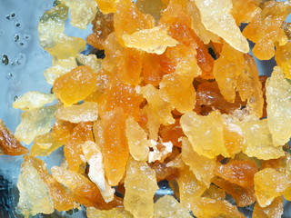 Abstract composition of gems of warm colors. Set of scraps of french fries after draining the oil