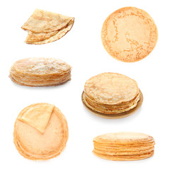 Set of tasty blini on white background