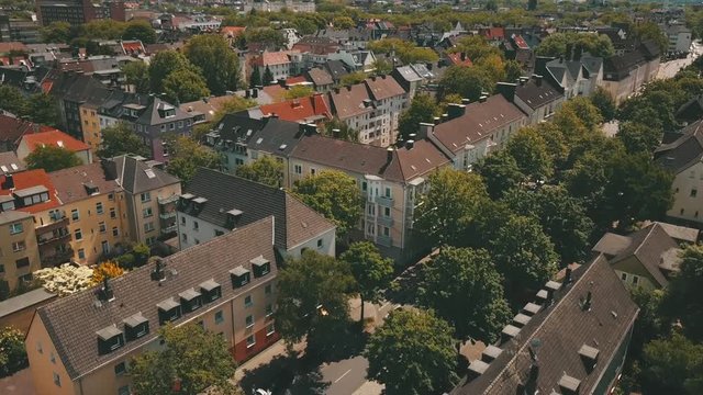 Aerial view of North Dortmund, Germany. Flying over a green park and houses
