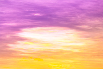 Iridescence in violet and orange color sky