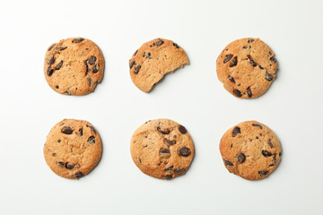 Flat lay with chocolate chip cookies on white background