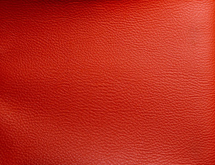 Orange faux leather. Faux leather texture close up