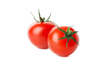 Fresh red tomatoes isolated on white background