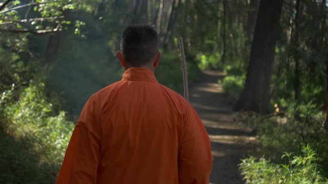 Man Dressing as a Monk walking