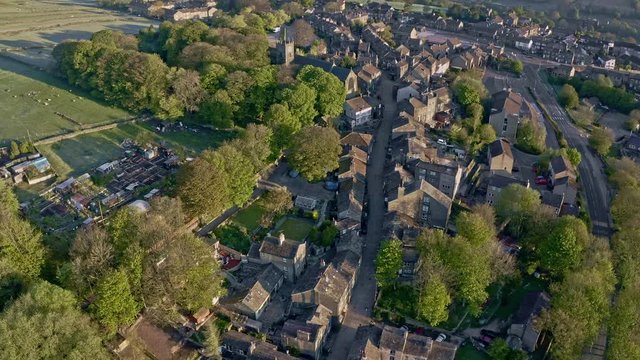 Aerial Shot of Haworth main street, near Keighley, West Yorkshire home of the Bronte Sisters, featuring St Michael & All Angels Church, where Maria Bront&euml;, Patrick Bront&euml;, Elizabeth Bront&euml;, are buried