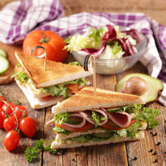 club sandwich- toasted sandwich with ham, tomato, lettuce and cucumber