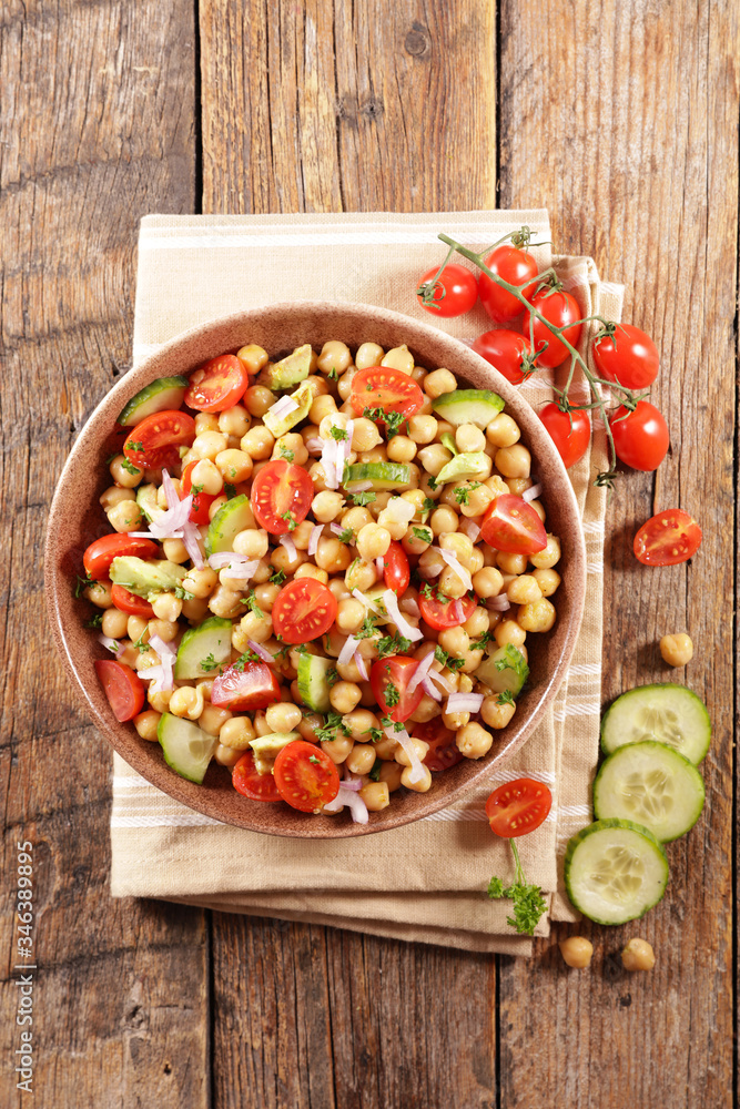 Wall mural chickpea salad with tomato and avocado