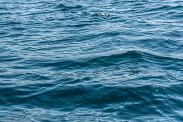 Blue seawater surface with small waves. Torrox Costa