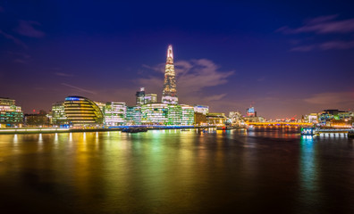 Fototapeta na wymiar Thames River Embankment and London Skyline at Sunset, United Kingdom
