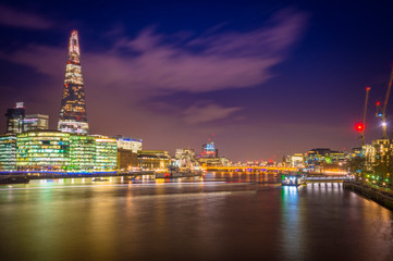 Naklejka premium Thames River Embankment and London Skyline at Sunset, United Kingdom