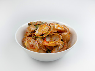 Stir fried clams with roasted chili on white background, Thai Food, Top view