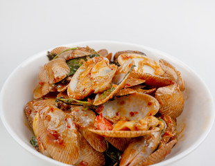 Stir fried clams with roasted chili on white background, Thai Food, Top view