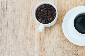 Cup of coffee on a wooden table  breakfast, flat lay