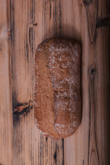 freshly baked bread on rustic wooden table