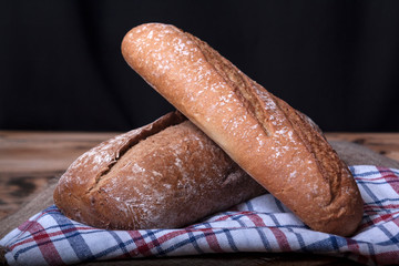 freshly baked bread on rustic wooden table