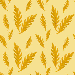 Light green leaves on a yellow pastel background. Seamless print for printing on fabric, wallpaper, scrap paper.