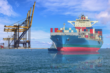 Fototapeta premium Logistics and transportation of international Container Cargo ship in the Ocean at blie sky freight Transport, shipping.