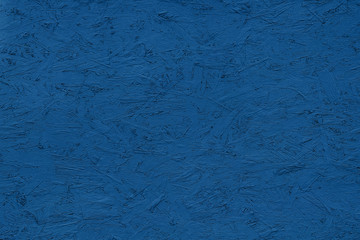 classic blue abstract grunge background of wooden chipboard OSB. decorative texture banner.