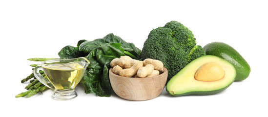 Different products rich in vitamin E on white background