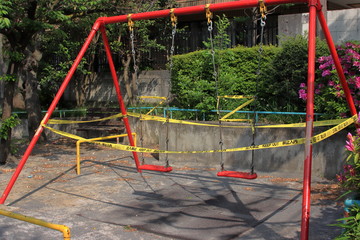 Fototapeta na wymiar empty playground in the park due to corona virus